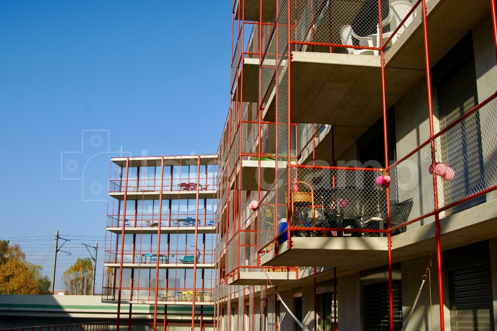 Interclamp tube clamp fittings used to construct the balconies and walkway guardrails for a student accommodation block in Switzerland, ensuring safety and stability.